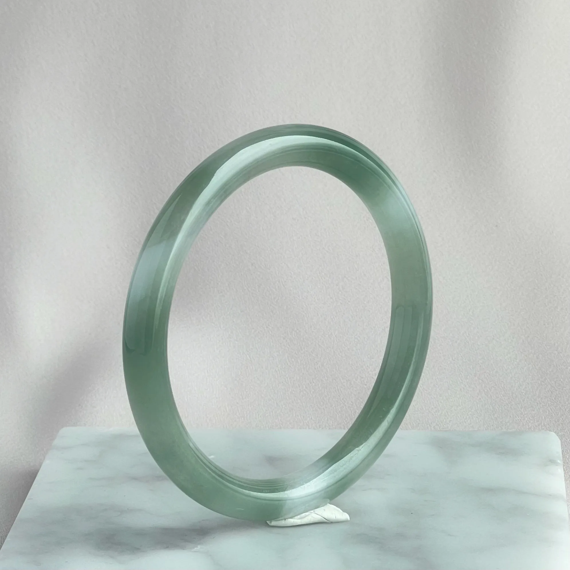 42055 55.5mm Highly Translucent Light Grape Green Jadeite Bangle