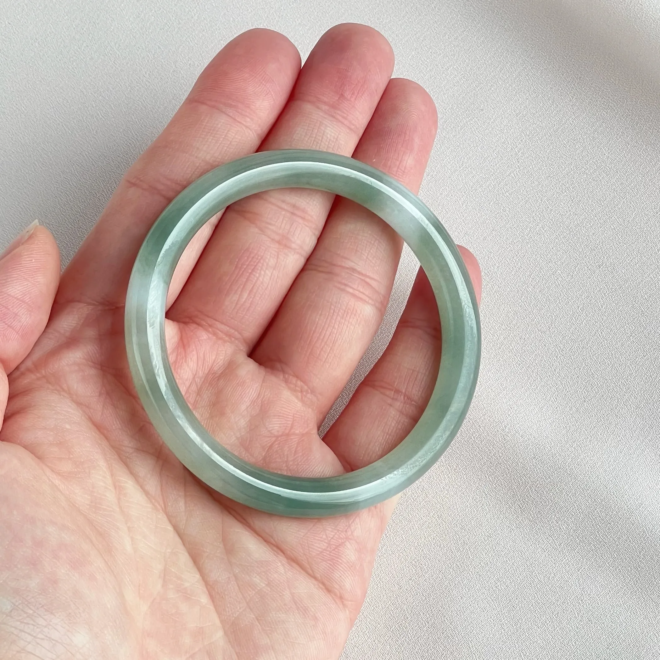 42055 55.5mm Highly Translucent Light Grape Green Jadeite Bangle
