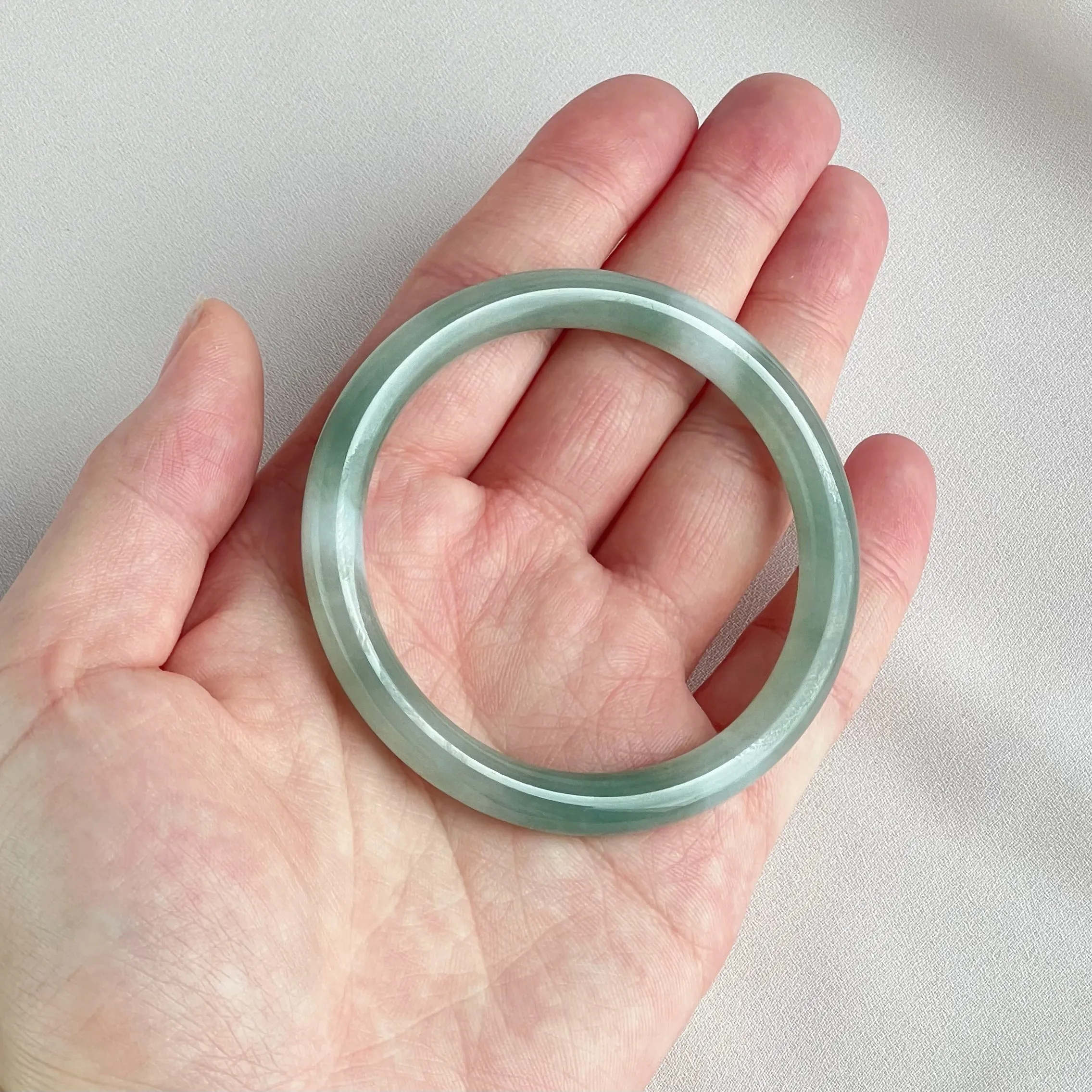 42055 55.5mm Highly Translucent Light Grape Green Jadeite Bangle