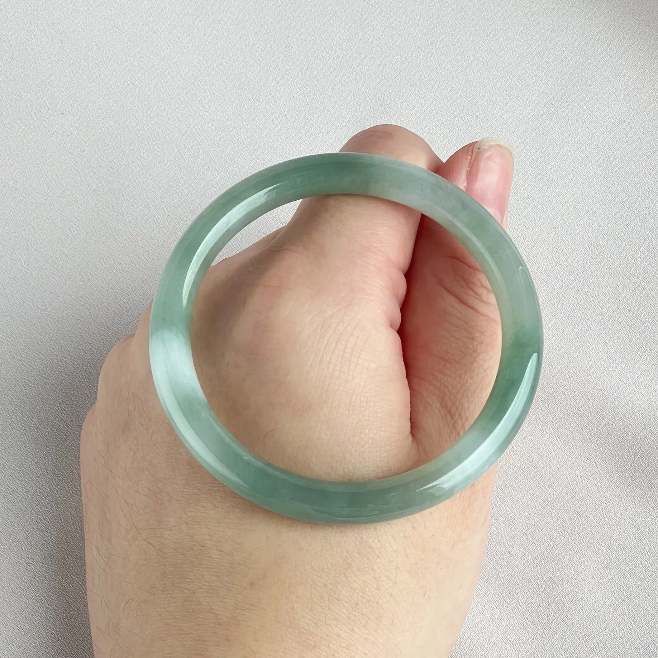 42055 55.5mm Highly Translucent Light Grape Green Jadeite Bangle