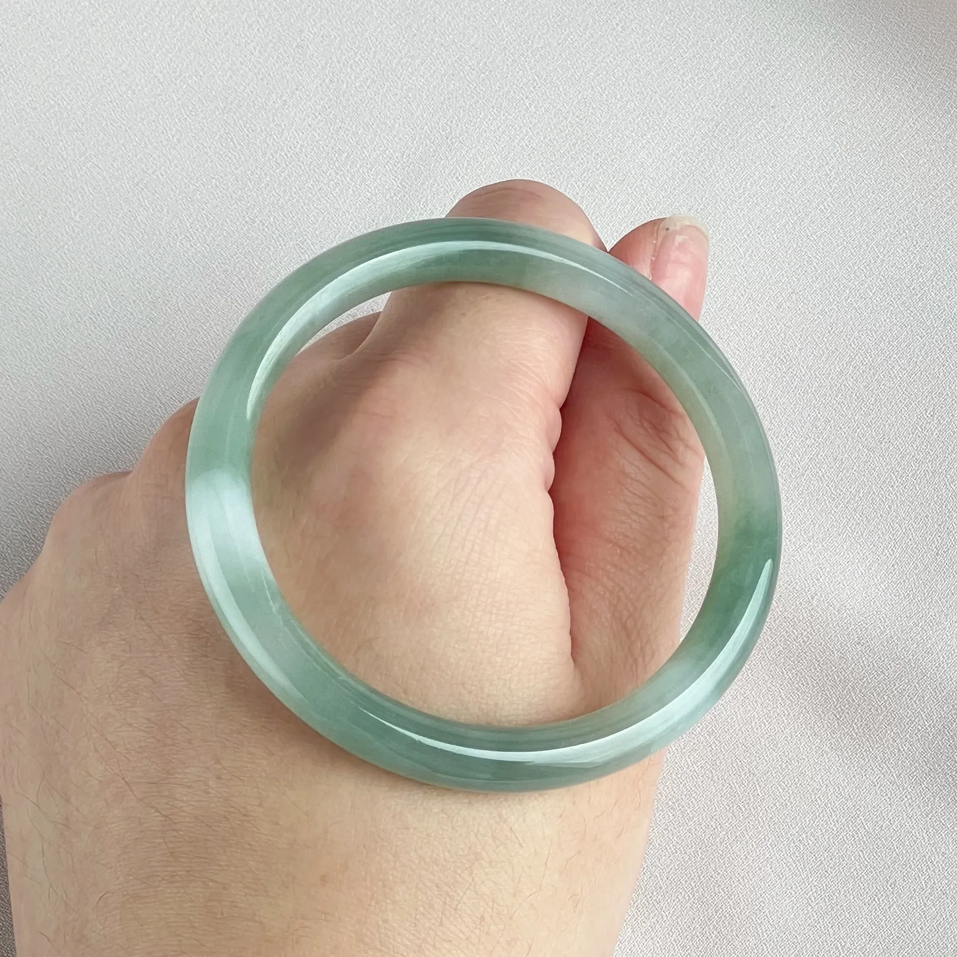 42055 55.5mm Highly Translucent Light Grape Green Jadeite Bangle
