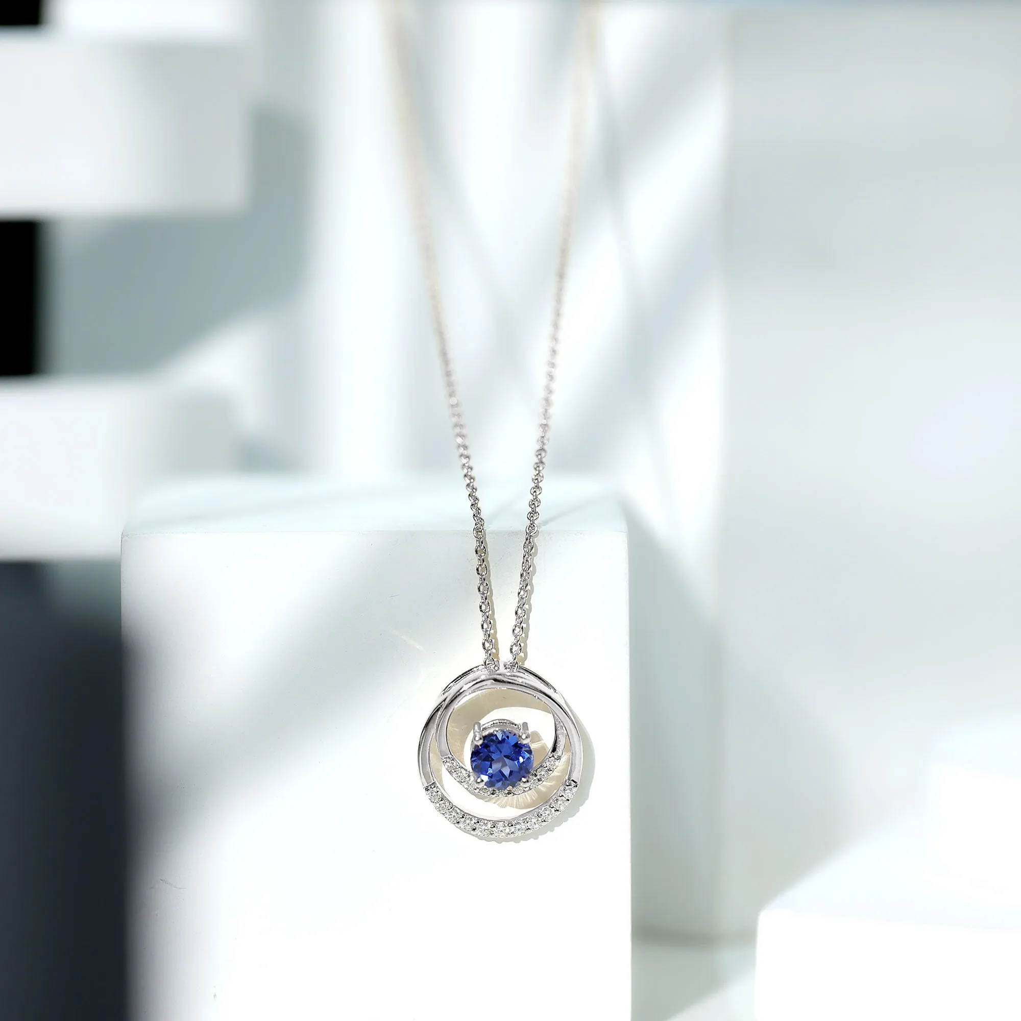 Certified Created Blue Sapphire and Moissanite Open Circle Pendant in Gold