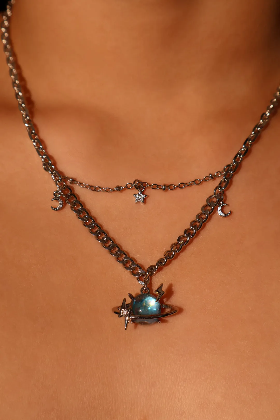 Platinum Plated Moonstone Saturn Star Necklace